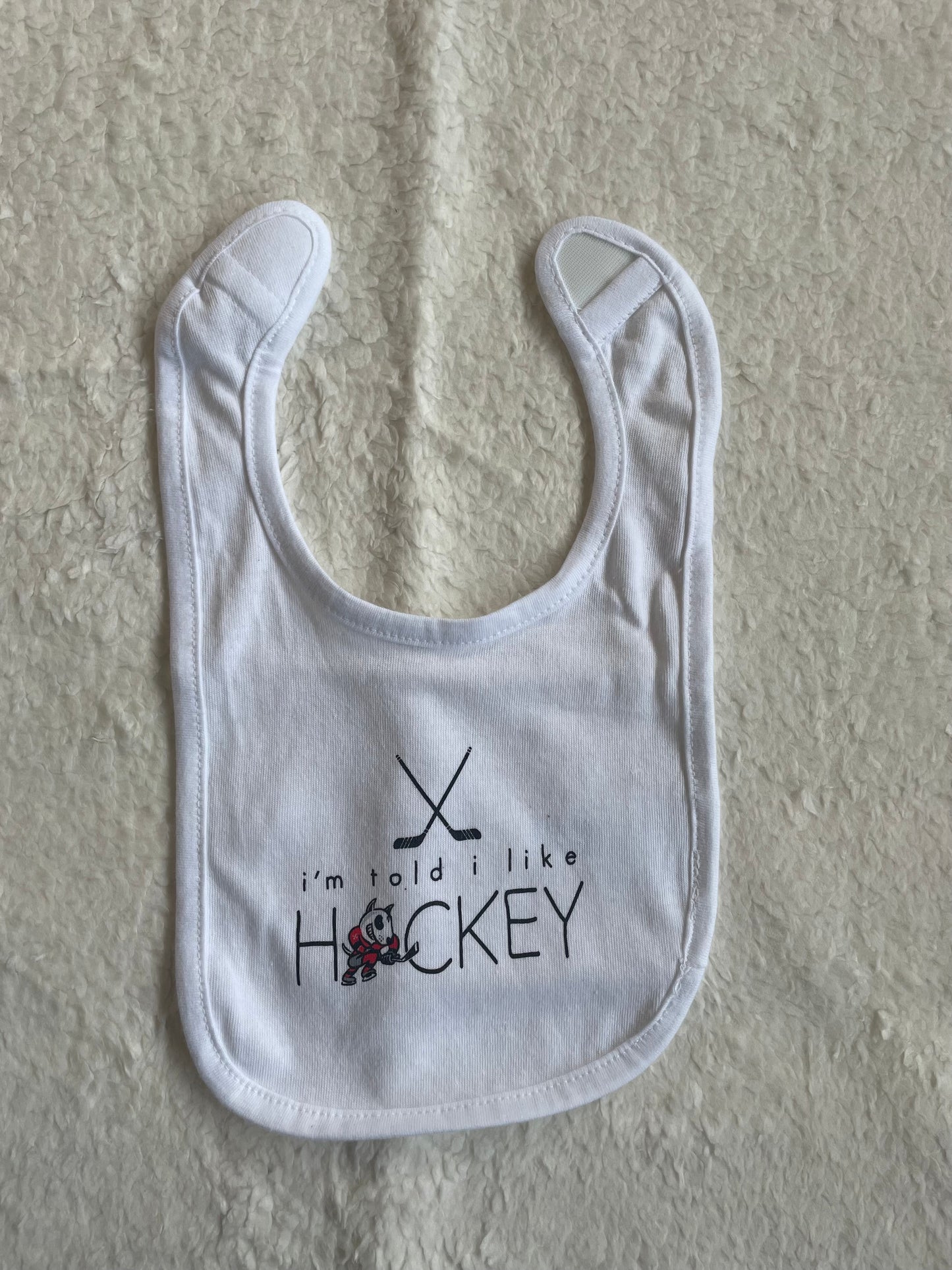 "I'm told I like Hockey" Bib